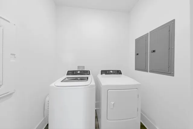 a utility room with dryer and washer