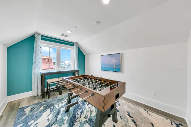 a view of a livingroom with furniture and window