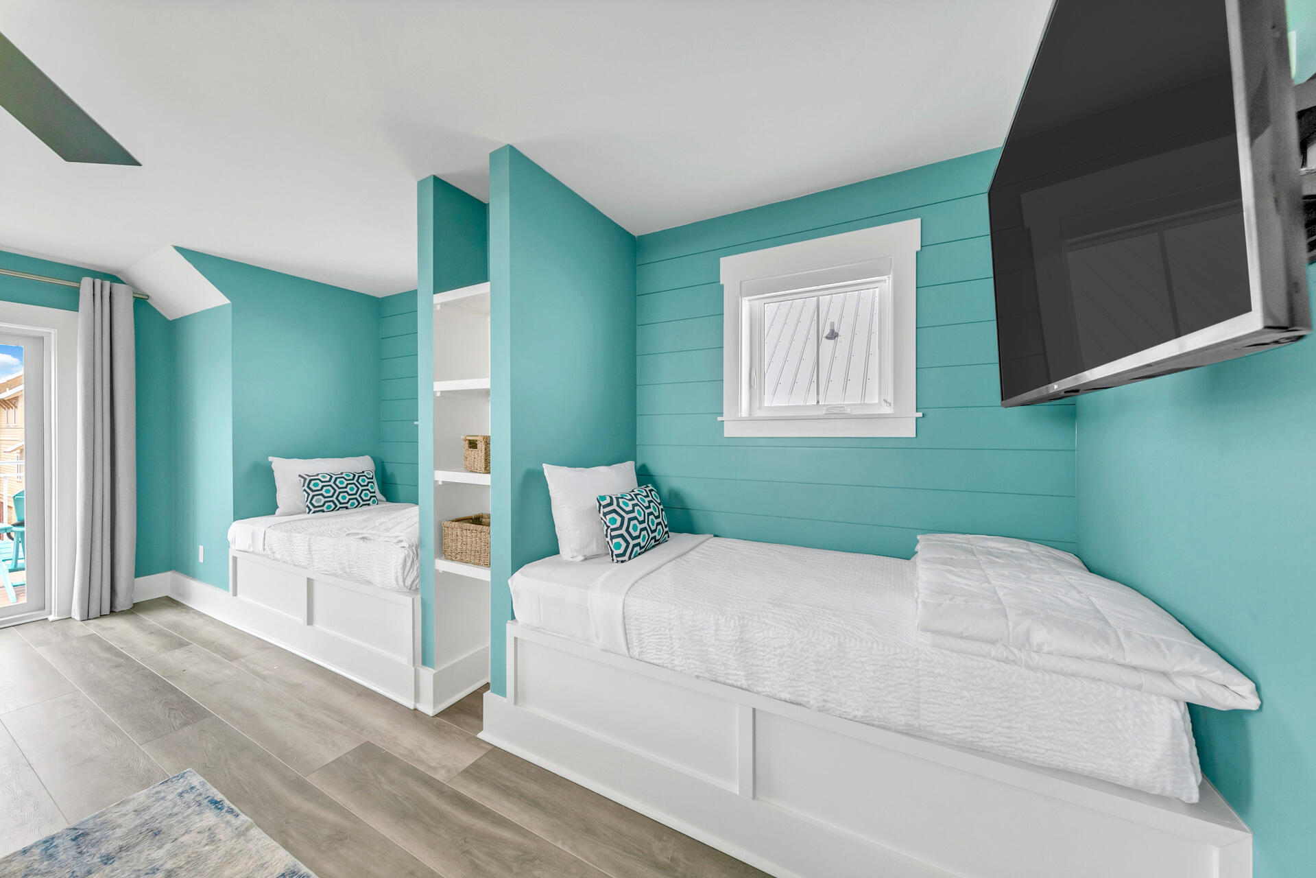 13662 Front Beach Road Panama City Beach, FL 32413 - Photo 40 of 46 a bedroom with a large bed and a flat screen tv