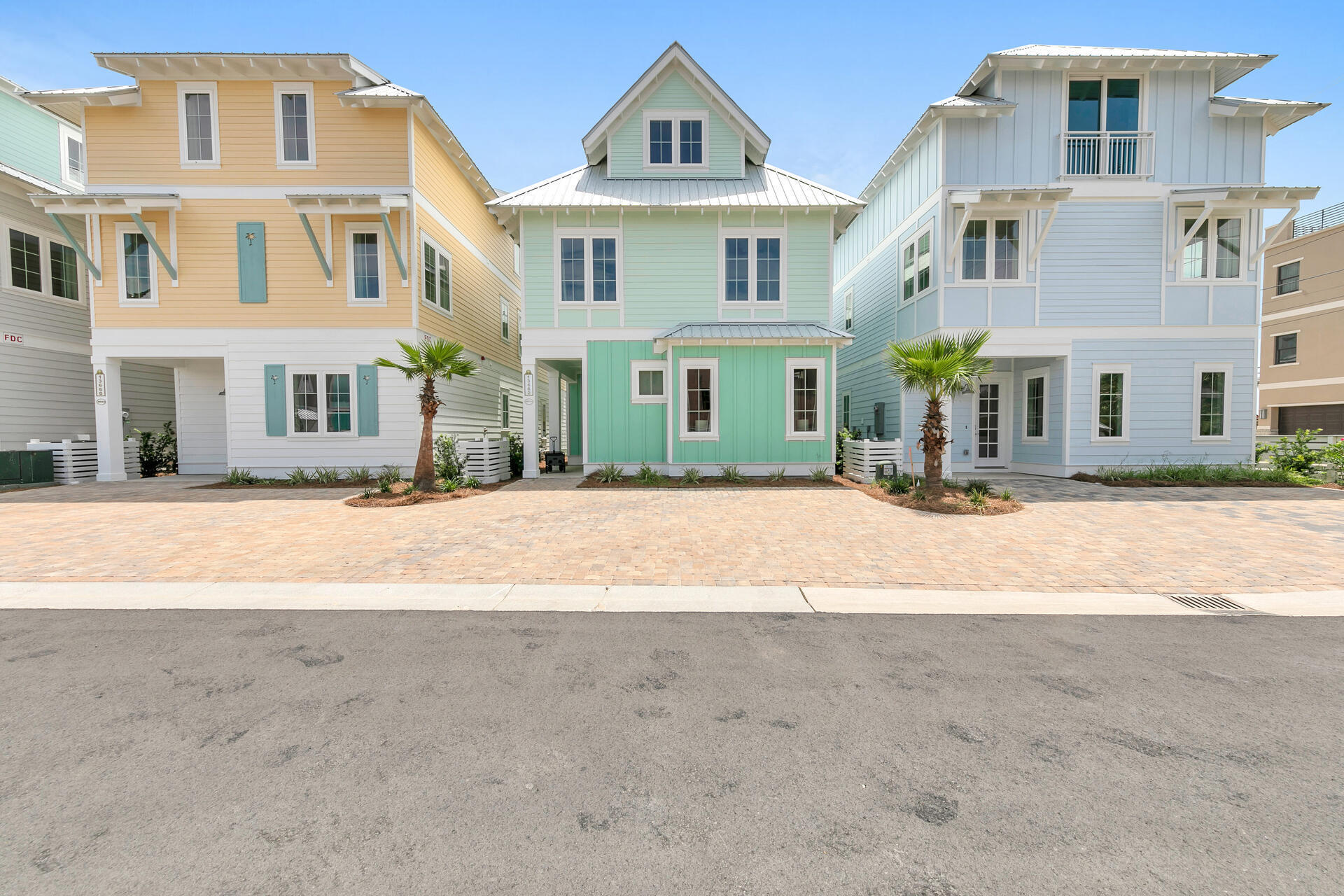 13662 Front Beach Road Panama City Beach, FL 32413 - Photo 44 of 46 a front view of residential houses with street