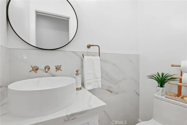 a bed room with a bed and a window