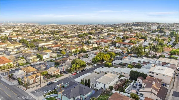 an aerial view of residential building with parking space