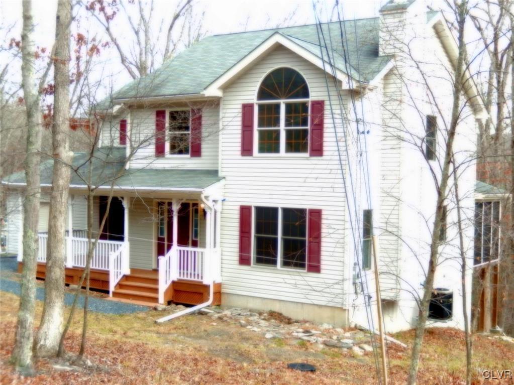 5886 Decker Road Bushkill, PA 18324 - Photo 1 of 15 a front view of a house with a yard
