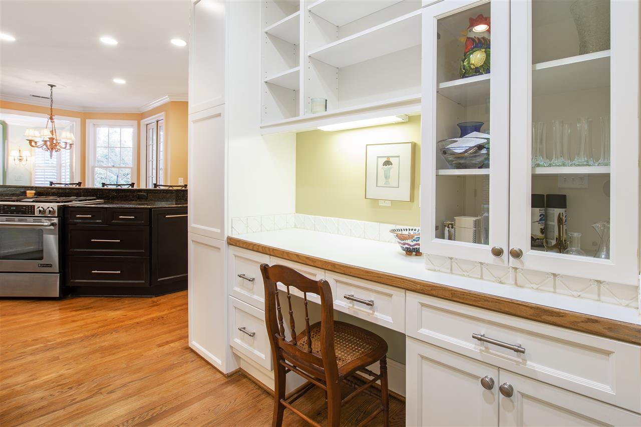 2514 Anderson Drive Raleigh, NC 27608 - Photo 17 of 30 Butler's panty/desk/ from the DR to the kitchen w/ an outside access