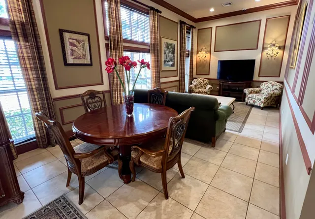 a view of a dining room with furniture