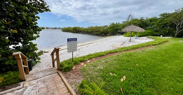 a view of a pathway with a park