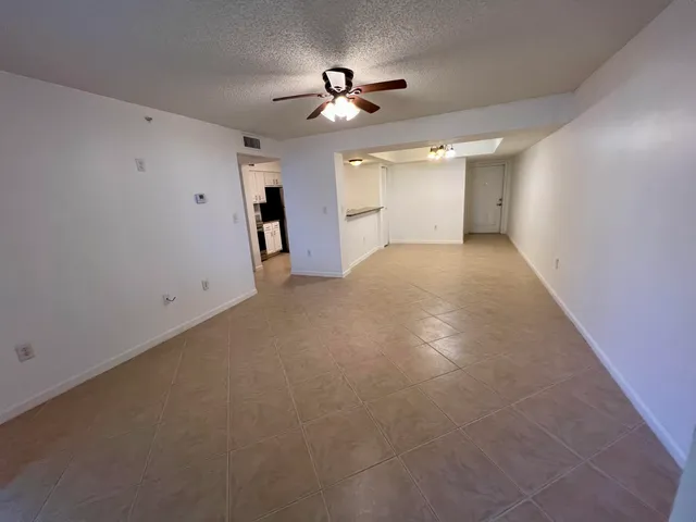 a view of a livingroom with a ceiling fan