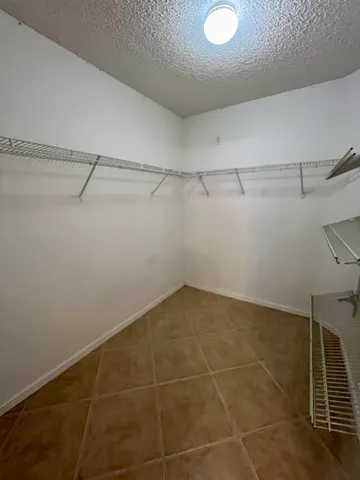 a view of a room with racks on the wall