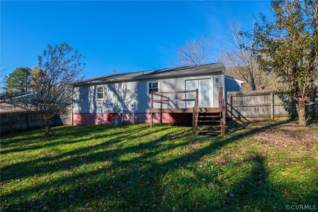 4617 Twelveoaks Road Midlothian, VA 23112 - Photo 35 of 42 a view of a house with a backyard porch and sitting area