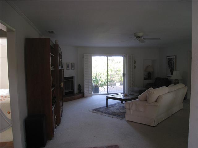 4989 Sleeping Indian Road Fallbrook, CA 92028 - Photo 3 of 8 Living room opening to deck.