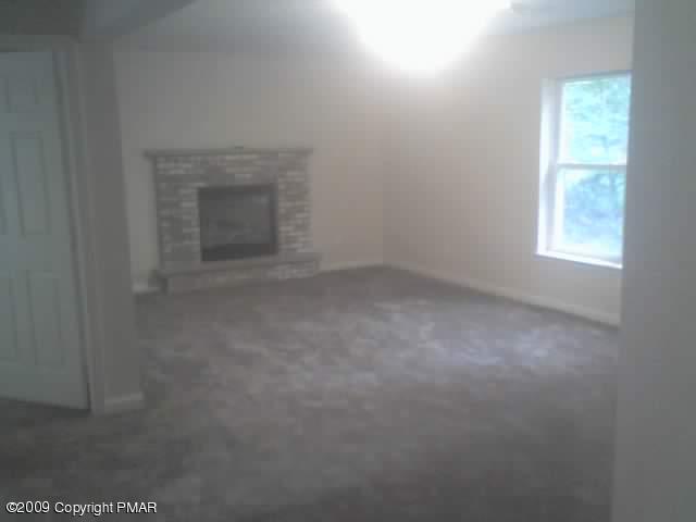 5203 Mayfair Road Tobyhanna, PA 18466 - Photo 12 of 13 Family Room with propane fireplace