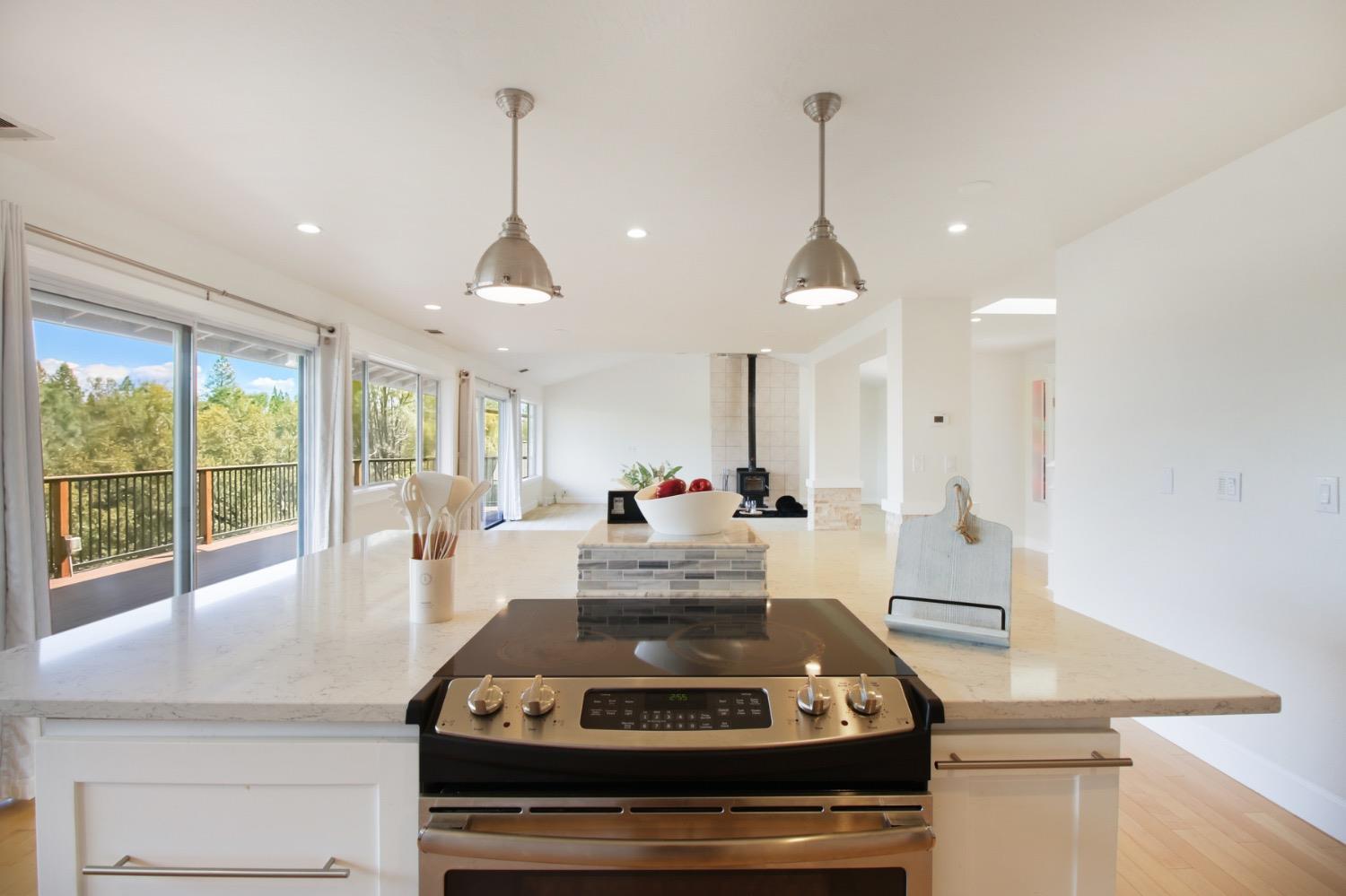 1276 Coon Court Cool, CA 95614 - Photo 20 of 79 a kitchen with stove and a large window