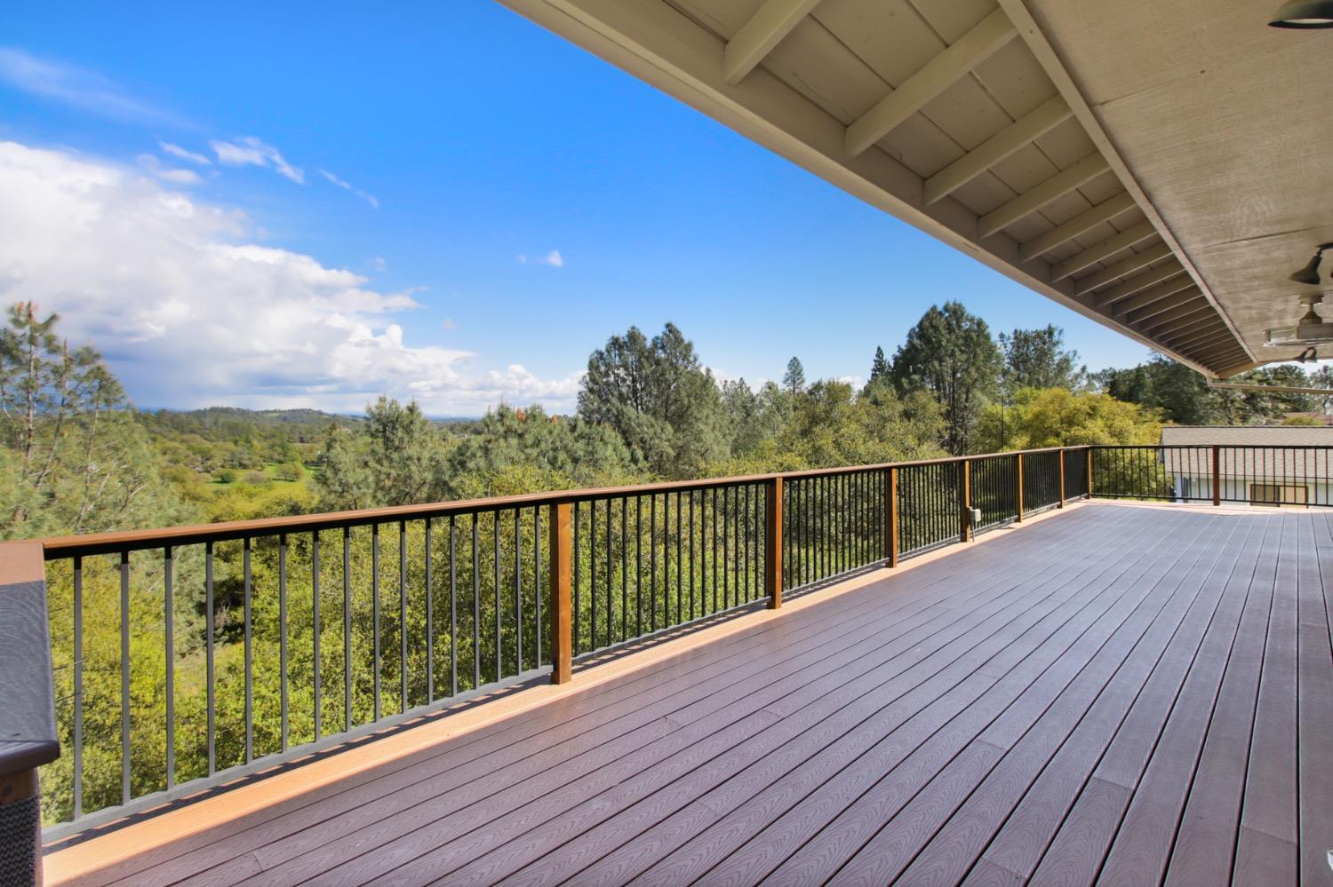1276 Coon Court Cool, CA 95614 - Photo 23 of 79 a view of balcony with wooden floor