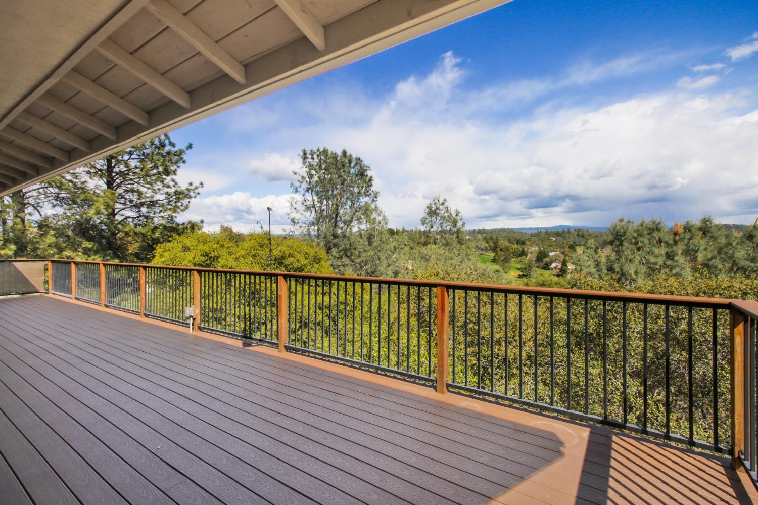 1276 Coon Court Cool, CA 95614 - Photo 25 of 79 a view of balcony with wooden floor & fence