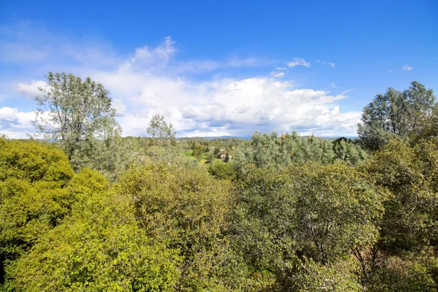 a view of porch with wooden floor