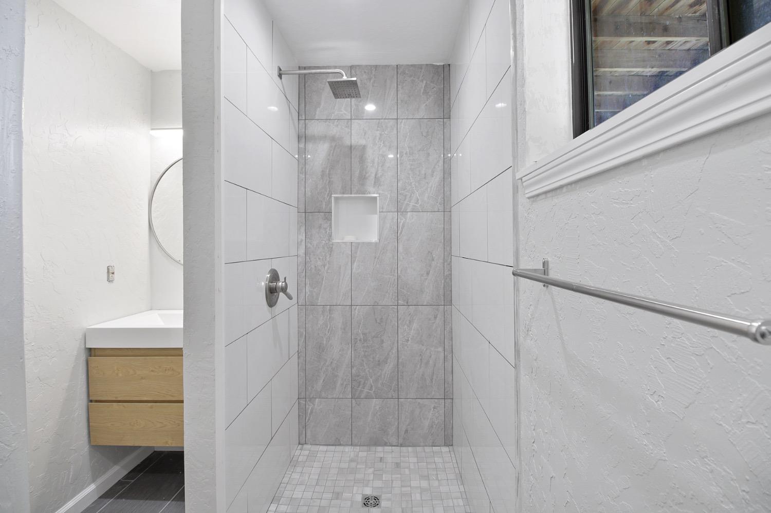 1276 Coon Court Cool, CA 95614 - Photo 34 of 79 a bathroom with a shower