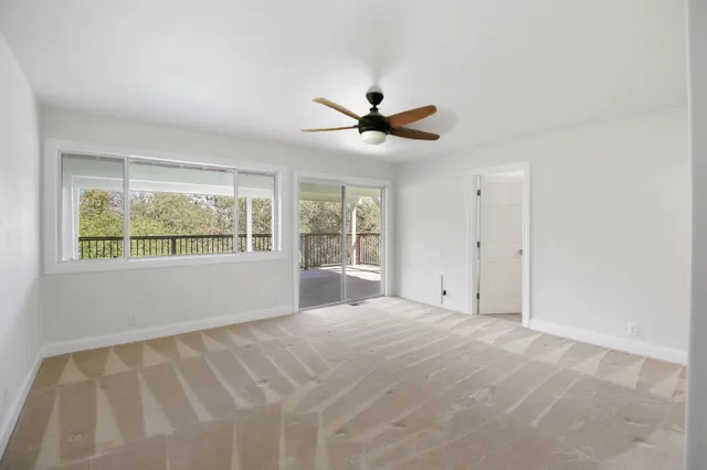 a view of a lake with a yard