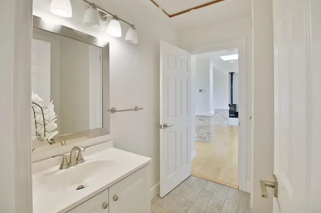 a aerial view of a house with a garden and plants