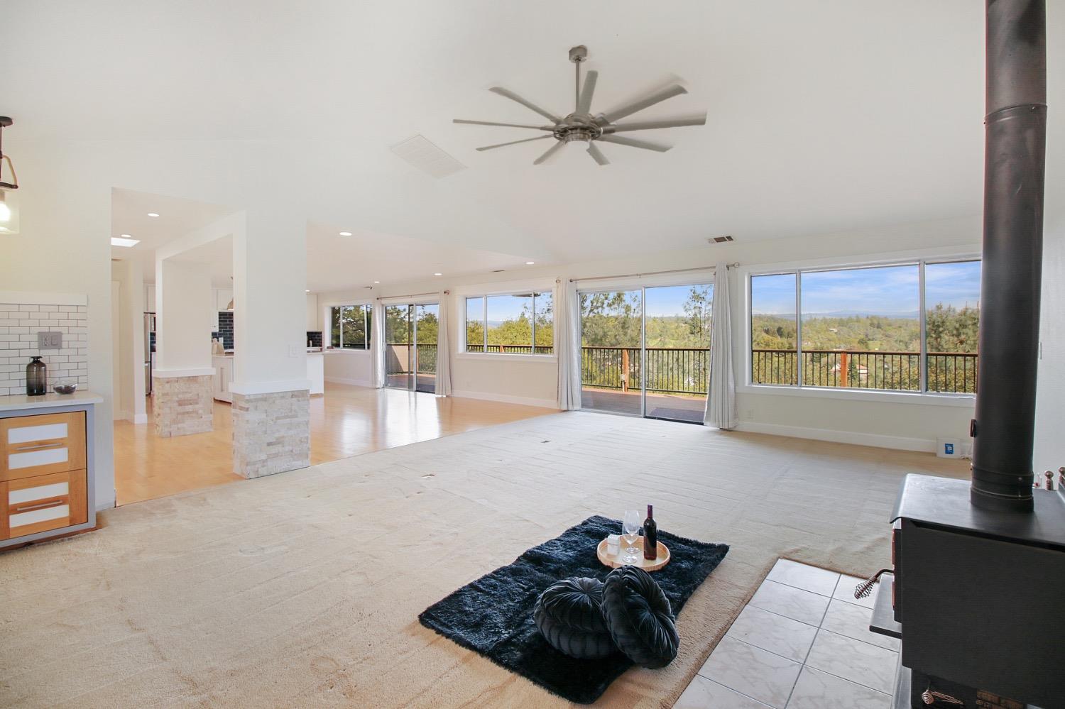 1276 Coon Court Cool, CA 95614 - Photo 5 of 79 a living room with furniture and a large window