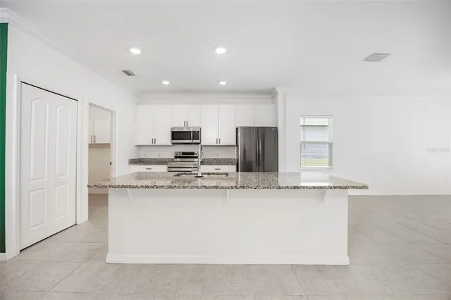 a view of swimming pool with a yard