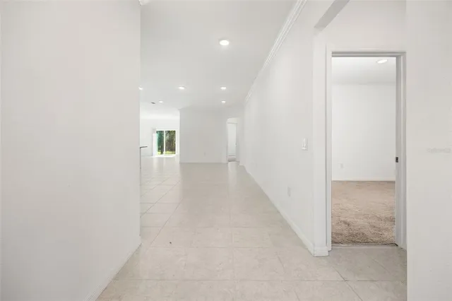a bathroom with a granite countertop toilet sink and mirror