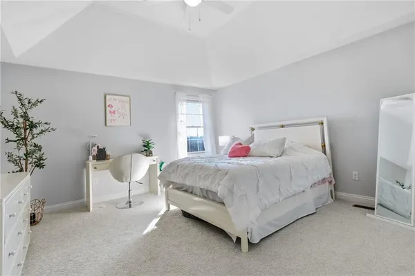 a view of kitchen with furniture and window