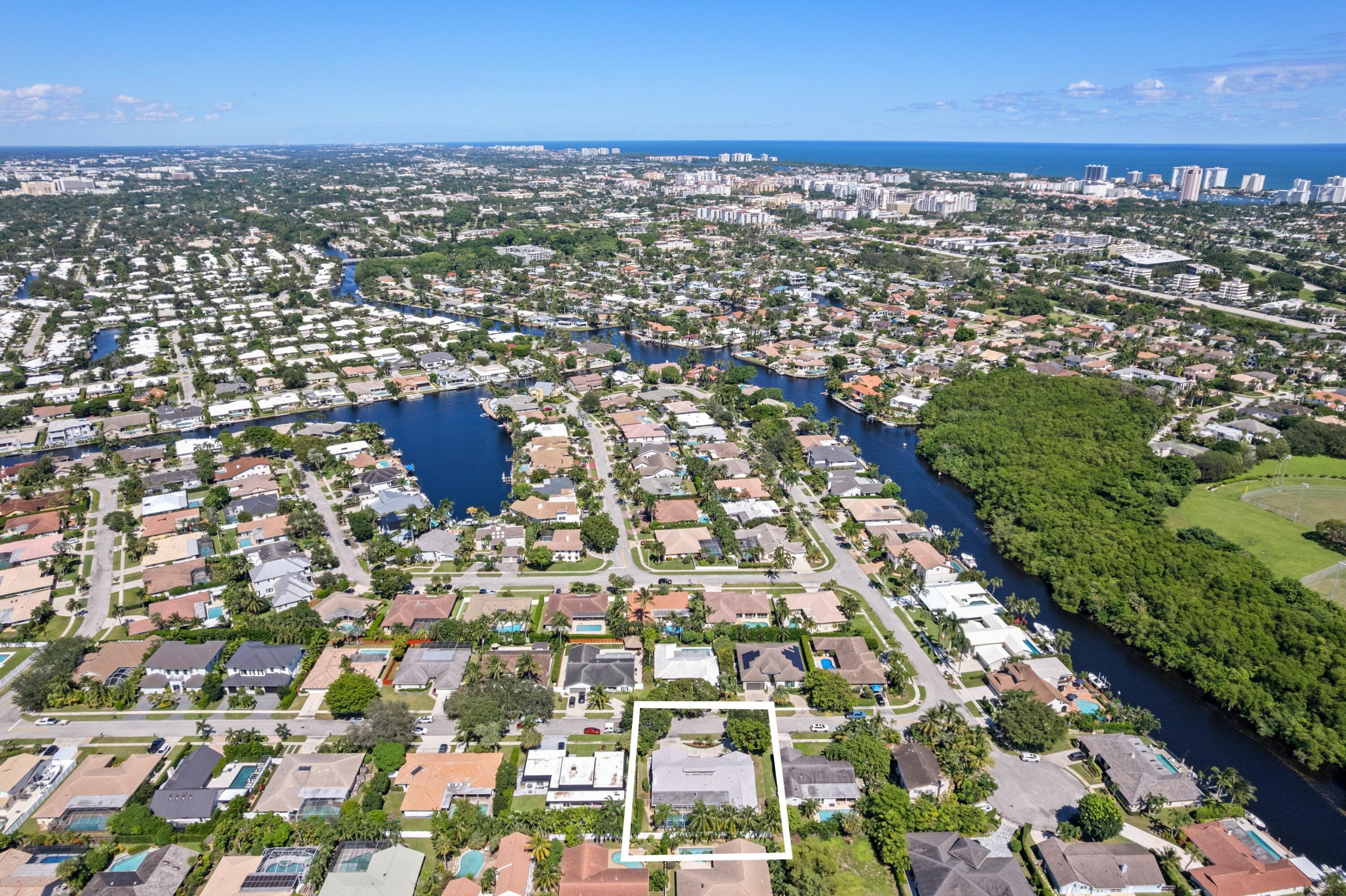620 Southwest 17th Street Boca Raton, FL 33486 - Photo 1 of 40 an aerial view of residential building with parking space