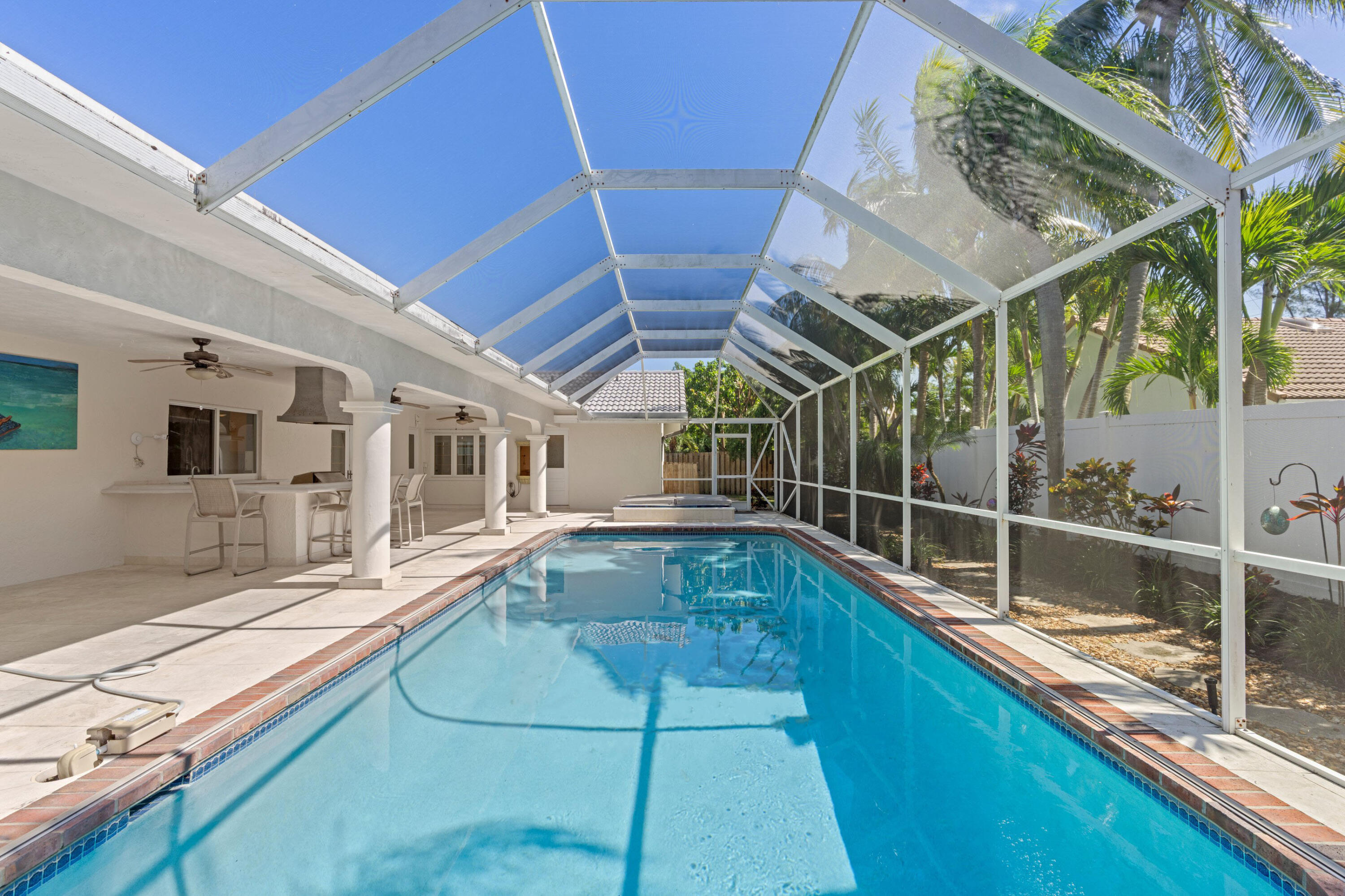 620 Southwest 17th Street Boca Raton, FL 33486 - Photo 15 of 40 a view of a backyard with swimming pool