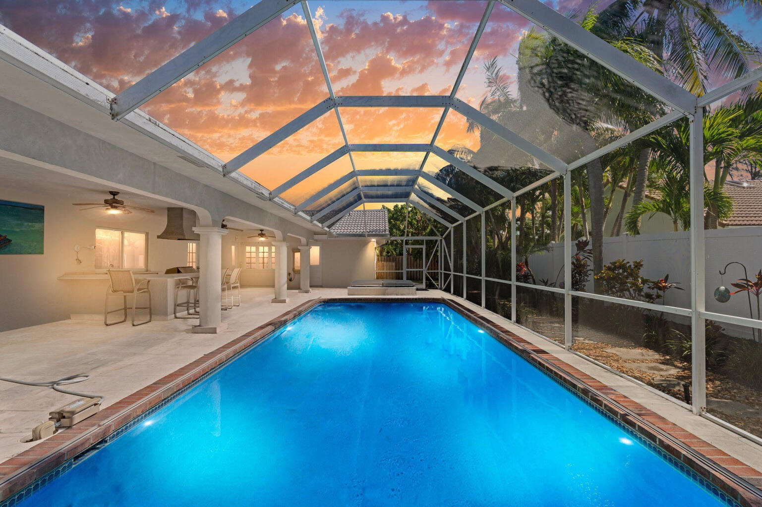 620 Southwest 17th Street Boca Raton, FL 33486 - Photo 3 of 40 a view of a living room with a swimming pool