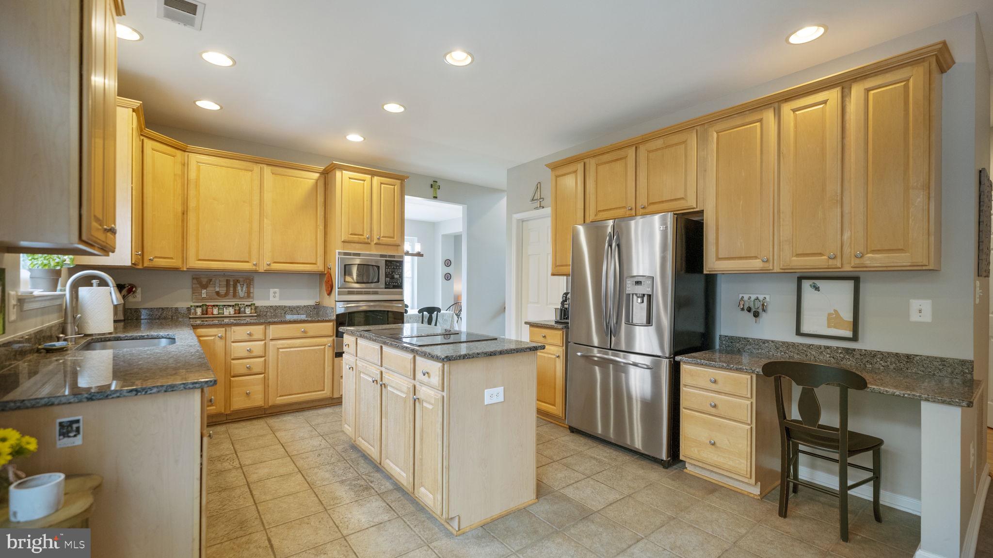 14206 Brass Wheel Road Boyds, MD 20841 - Photo 12 of 34 Granite counters & a built in desk