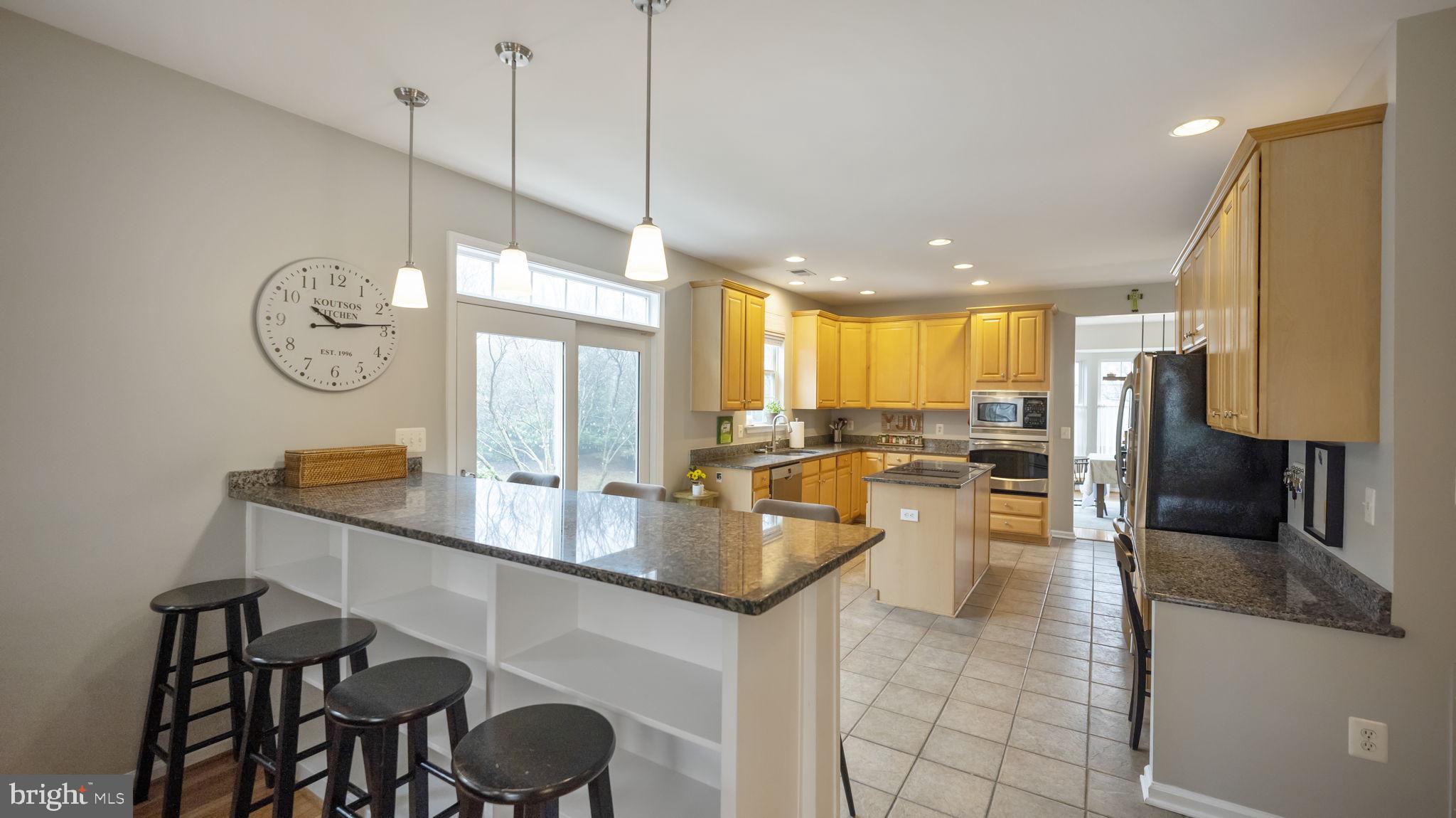 14206 Brass Wheel Road Boyds, MD 20841 - Photo 3 of 34 Enjoy the modern function of the kitchen
