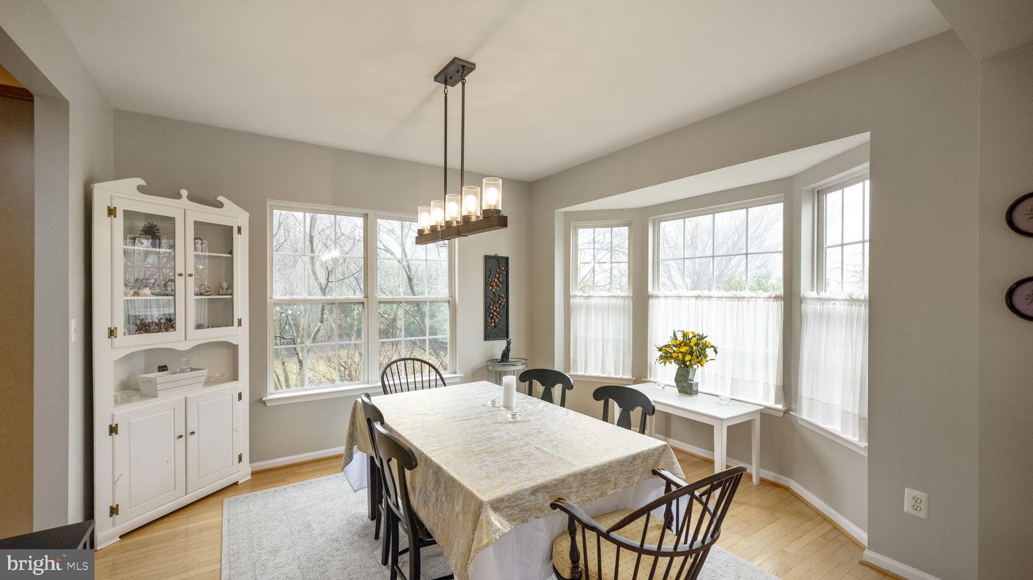 14206 Brass Wheel Road Boyds, MD 20841 - Photo 9 of 34 Formal dining room with fantastic bay window