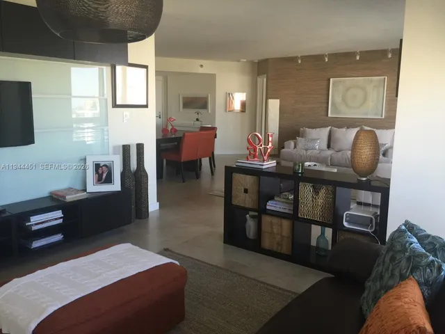 a bedroom with a bed and a furniture