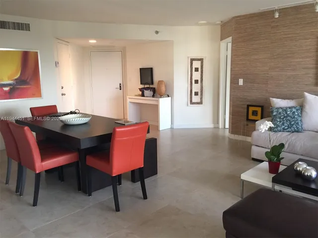 a view of a dining room with furniture