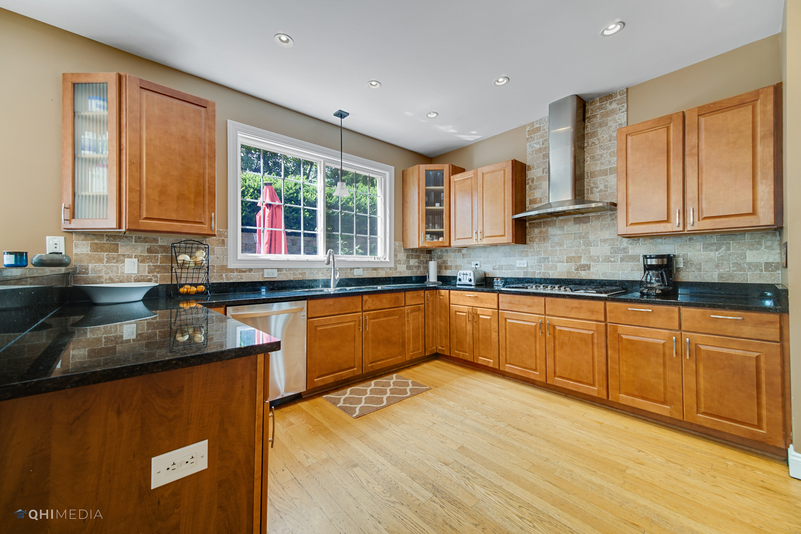 5213 Hayes Road Algonquin, IL 60102 - Photo 2 of 36 a kitchen with stainless steel appliances granite countertop a sink stove and cabinets