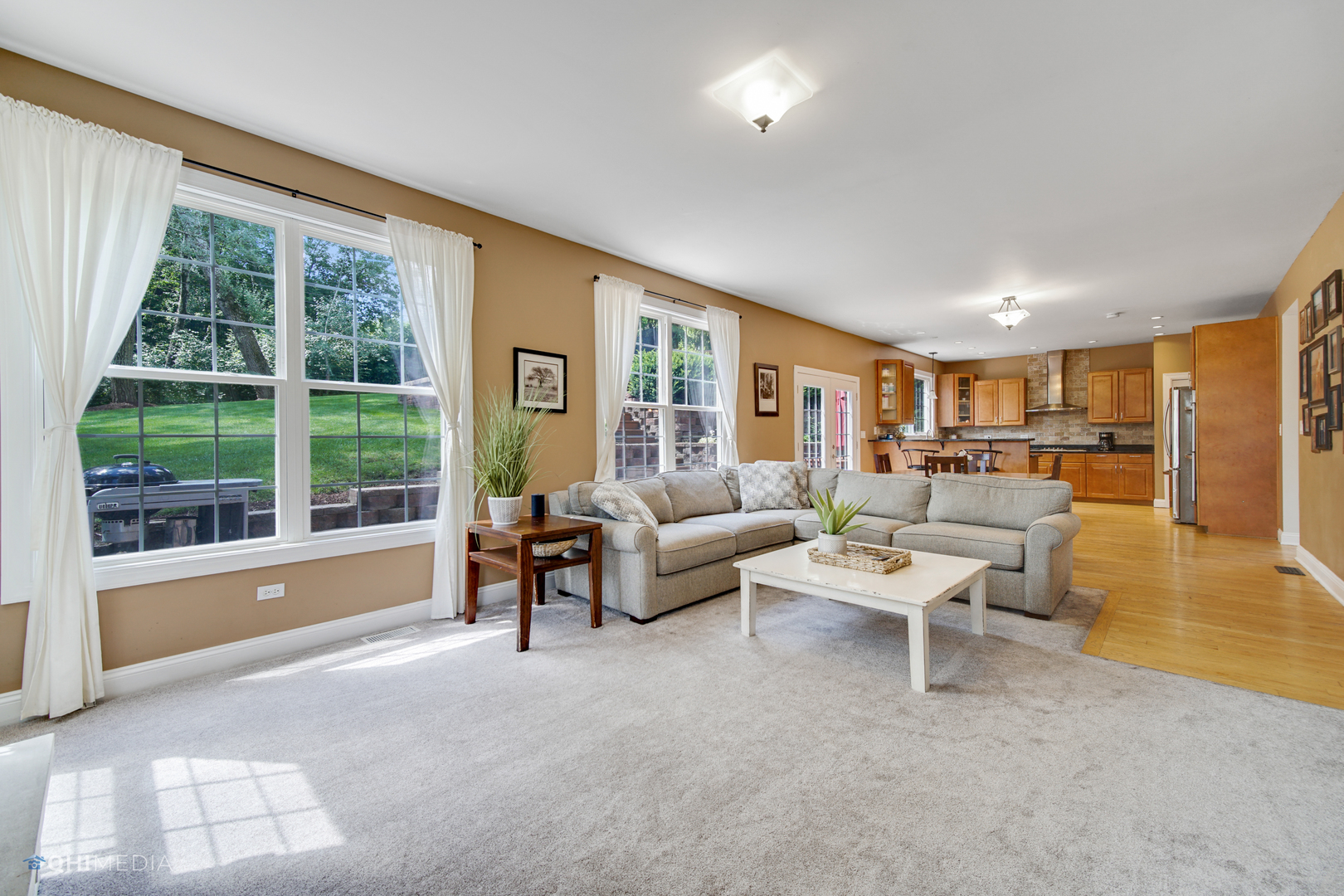 5213 Hayes Road Algonquin, IL 60102 - Photo 11 of 36 a living room with furniture and a large window