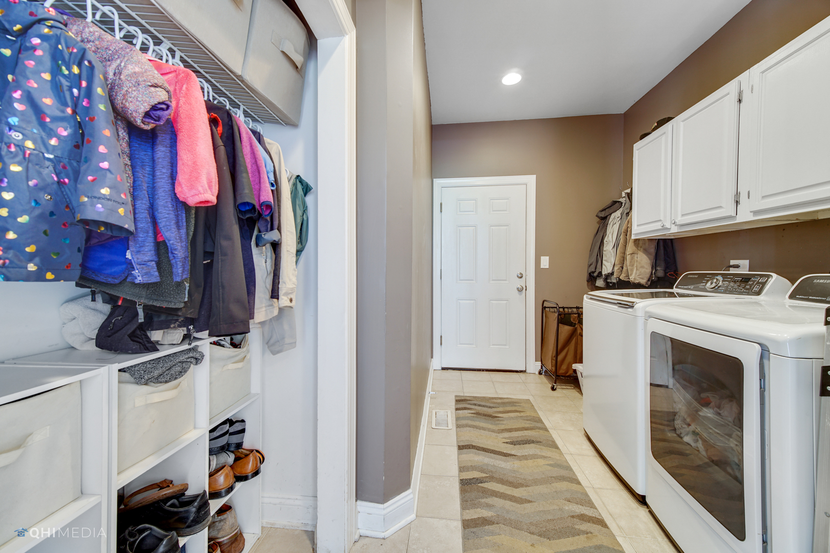 5213 Hayes Road Algonquin, IL 60102 - Photo 18 of 36 a view of walk in closet with clothes and shoes