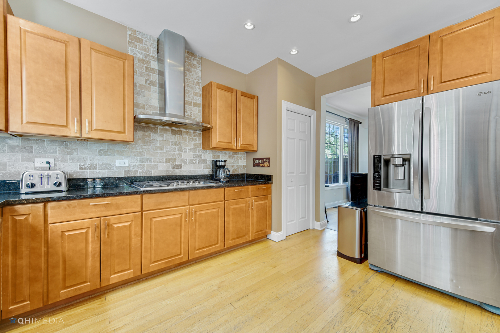 5213 Hayes Road Algonquin, IL 60102 - Photo 3 of 36 a kitchen with stainless steel appliances granite countertop a refrigerator a sink and a stove