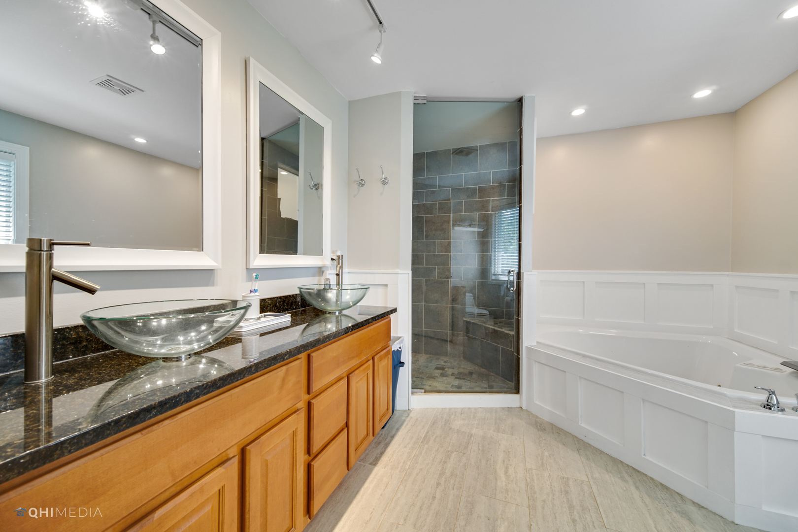 5213 Hayes Road Algonquin, IL 60102 - Photo 21 of 36 a bathroom with a granite countertop sink mirror and a bath tub
