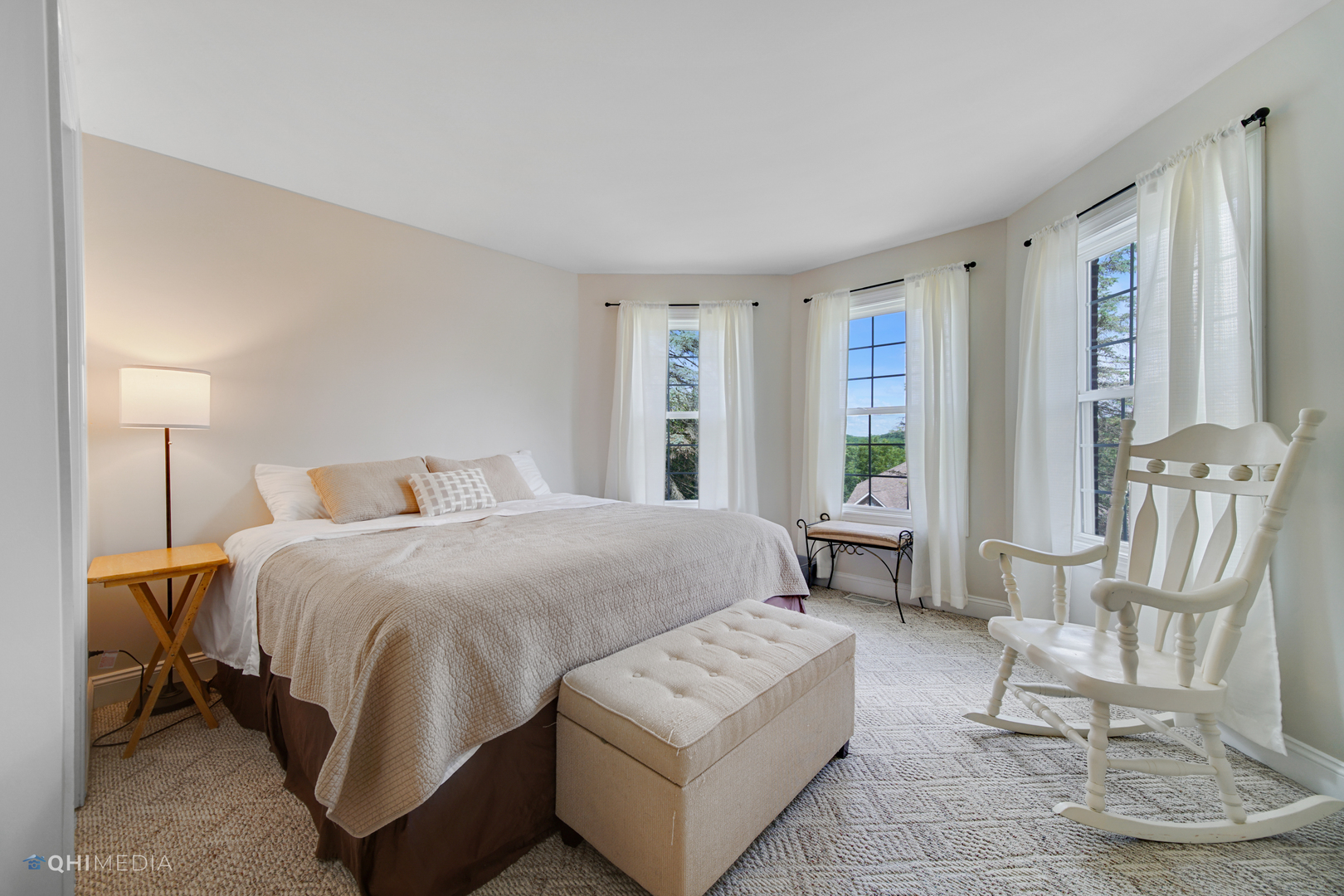 5213 Hayes Road Algonquin, IL 60102 - Photo 22 of 36 a spacious bedroom with a bed a table and chair