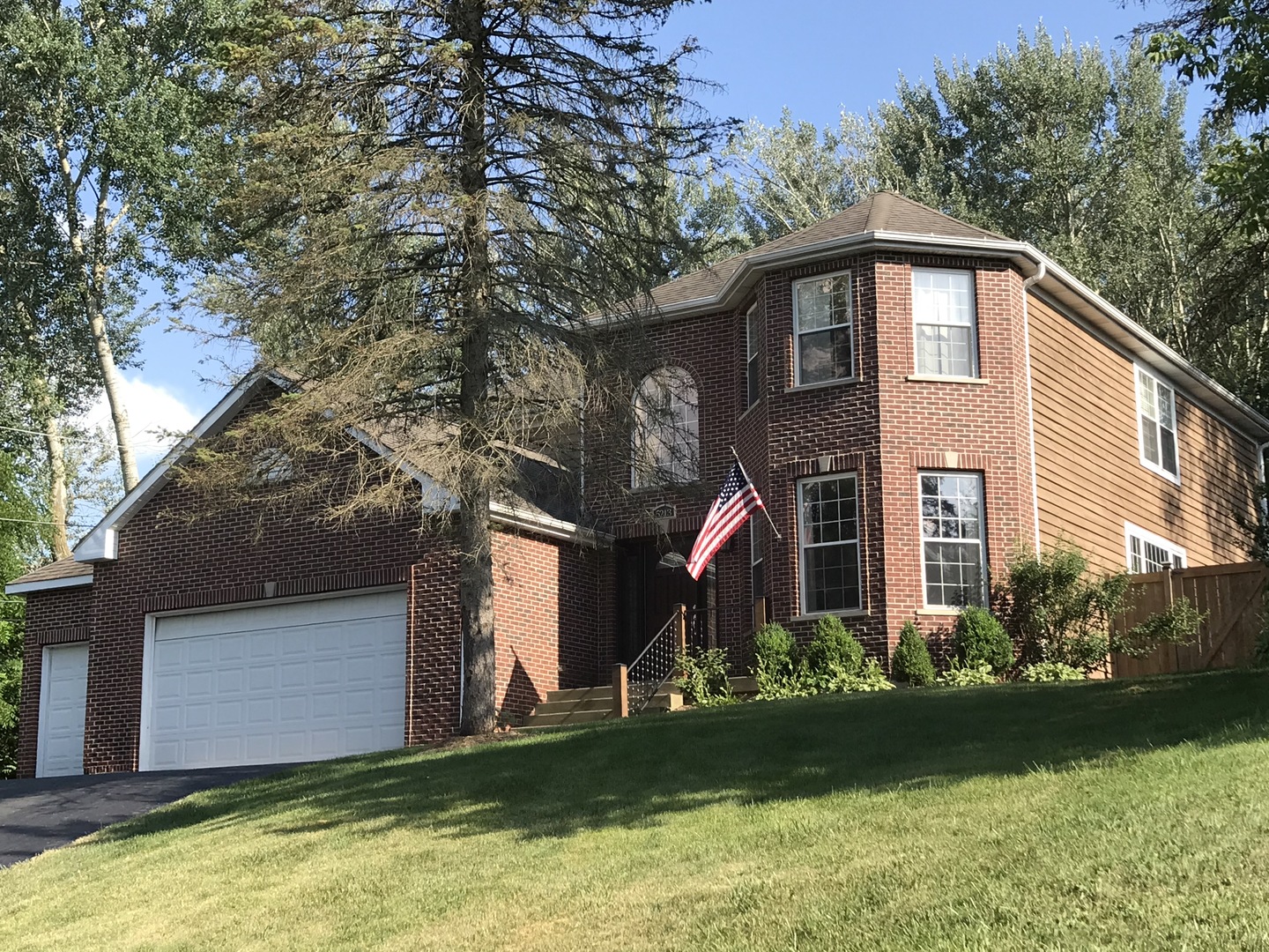 5213 Hayes Road Algonquin, IL 60102 - Photo 36 of 36 a house that has a tree in front of it