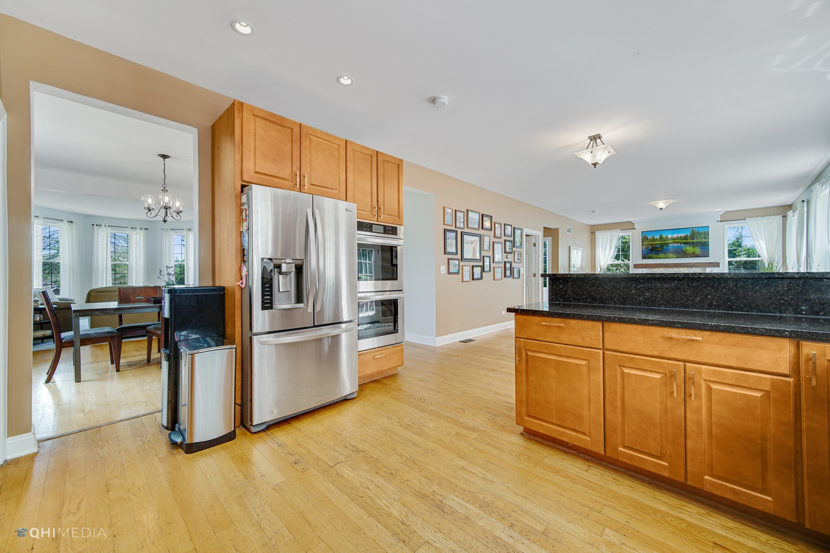 5213 Hayes Road Algonquin, IL 60102 - Photo 5 of 36 a kitchen with stainless steel appliances granite countertop a refrigerator and a sink