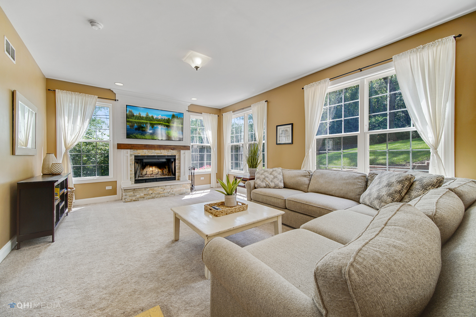 5213 Hayes Road Algonquin, IL 60102 - Photo 9 of 36 a living room with furniture window and a fireplace
