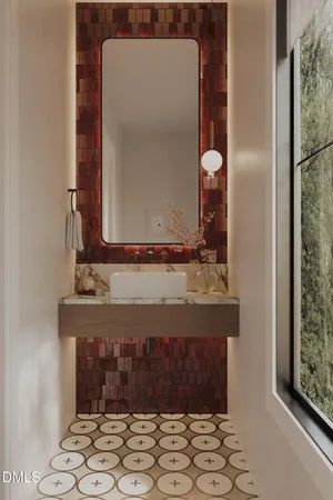 a bathroom with a mirror and a sink