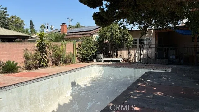 a view of a chairs and tables in the patio