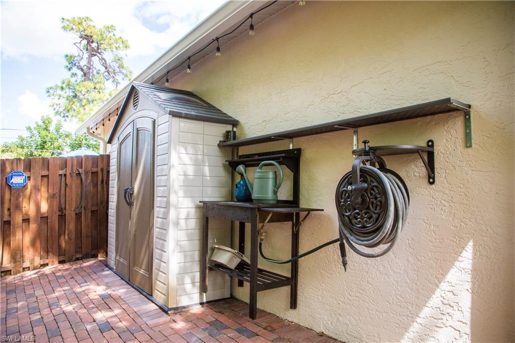 9143 Irving Road Fort Myers, FL 33967 - Photo 13 of 14 a view of a porch with wooden floor