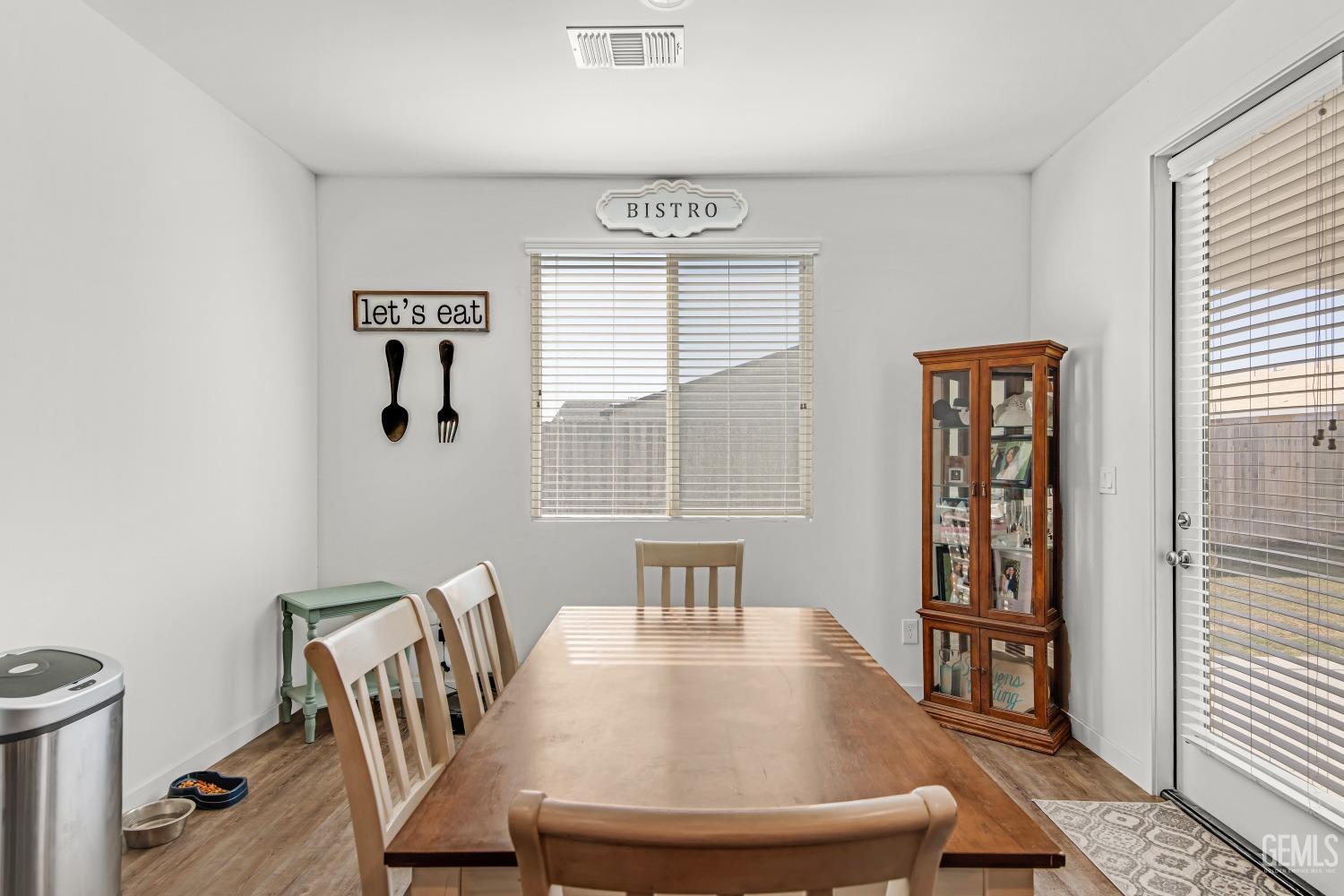 Undisclosed Address Bakersfield, CA 93313 - Photo 11 of 45 a view of a dining room with furniture