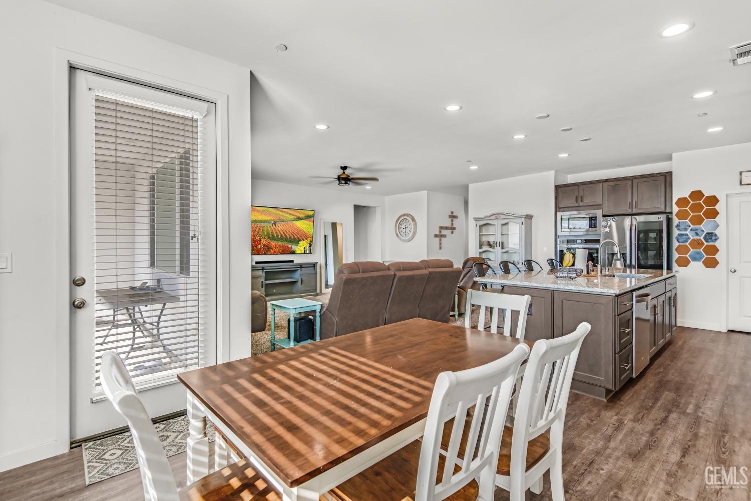 Undisclosed Address Bakersfield, CA 93313 - Photo 13 of 45 a view of a dining room with furniture