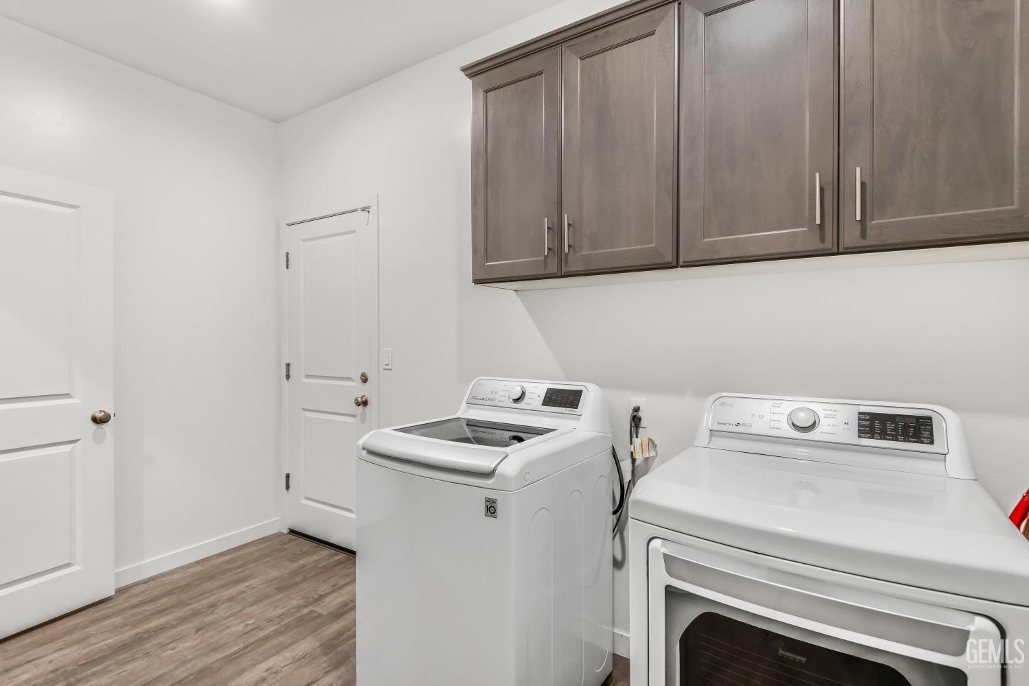 Undisclosed Address Bakersfield, CA 93313 - Photo 32 of 45 a utility room with dryer and washer