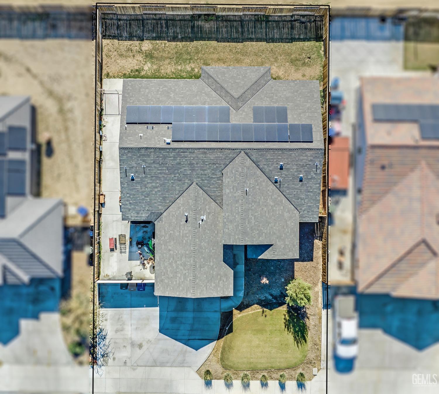 Undisclosed Address Bakersfield, CA 93313 - Photo 45 of 45 a aerial view of a house with a yard